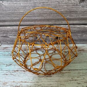 Wire egg basket painted copper color